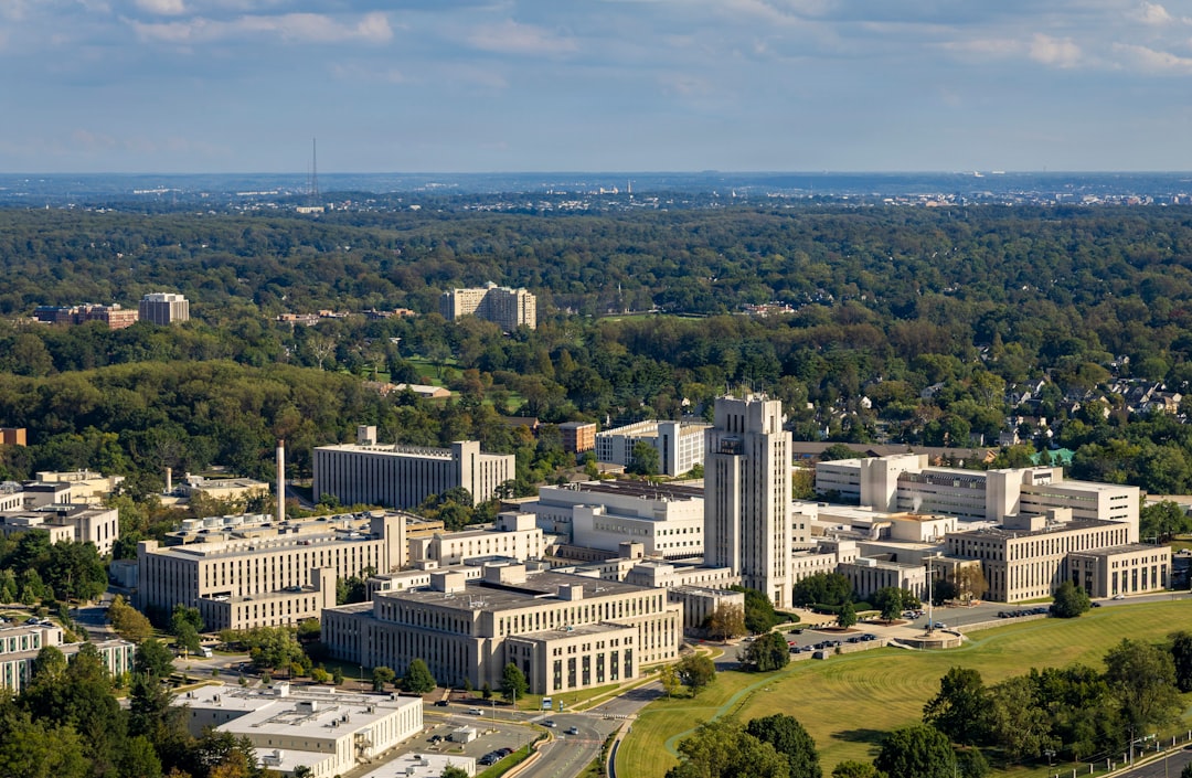 Aerial view of a large university campus with modern buildings.