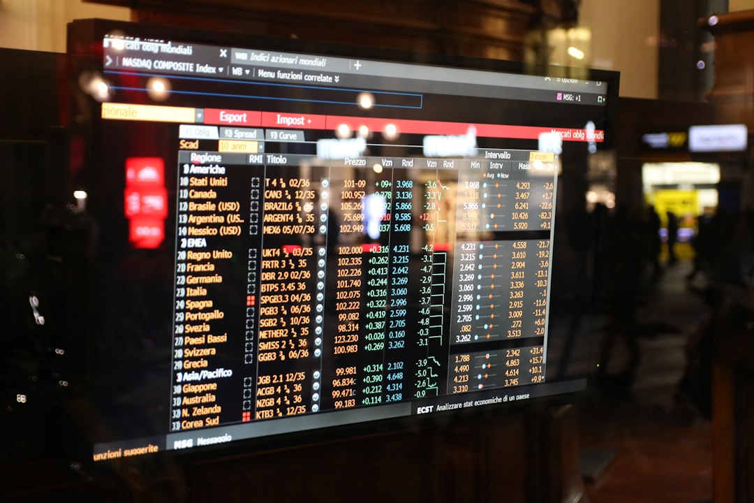 Financial stock market data displayed on a screen.