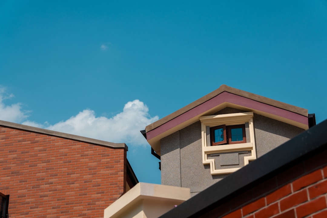 Roofs and sky with scattered clouds