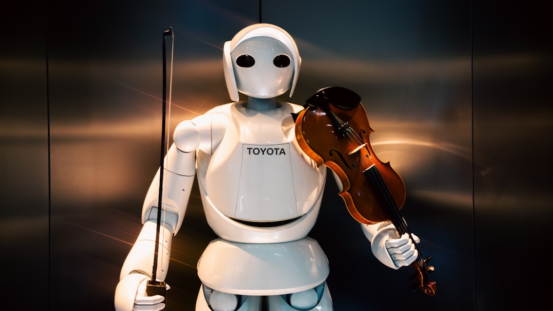 A white robot holding a violin and bow