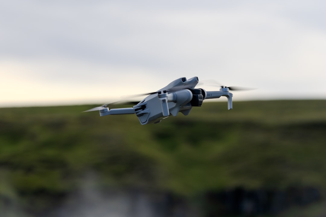 A small drone flying in the air